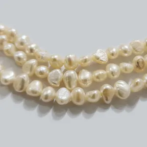 Freshwater Real Pearl Sold Per line in size Approximately 5~6mm and length about  14  1/12 Inches Long