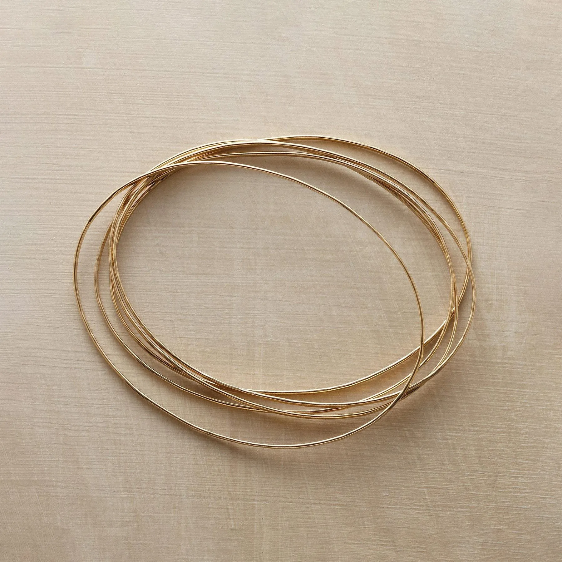 Golden Orbit Bangle Bracelets