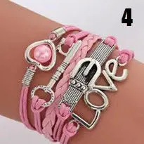 Handmade leather braided bracelet with variety of charms