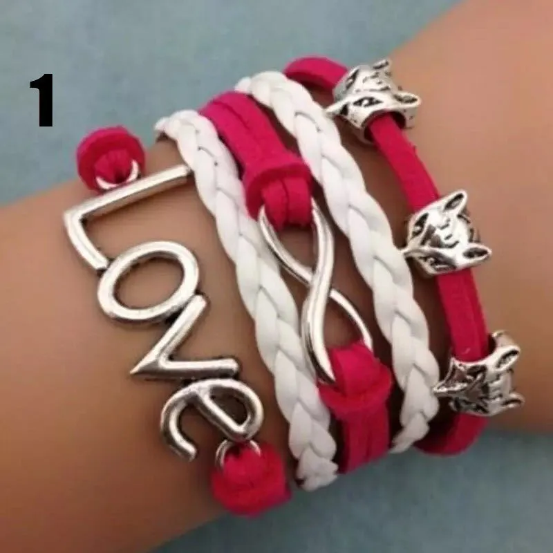 Handmade leather braided bracelet with variety of charms