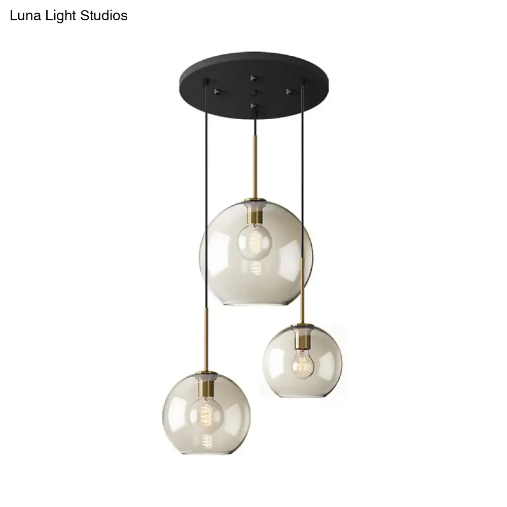 Minimalist 3-Light Pendant with Amber Glass Shade and Black Finish