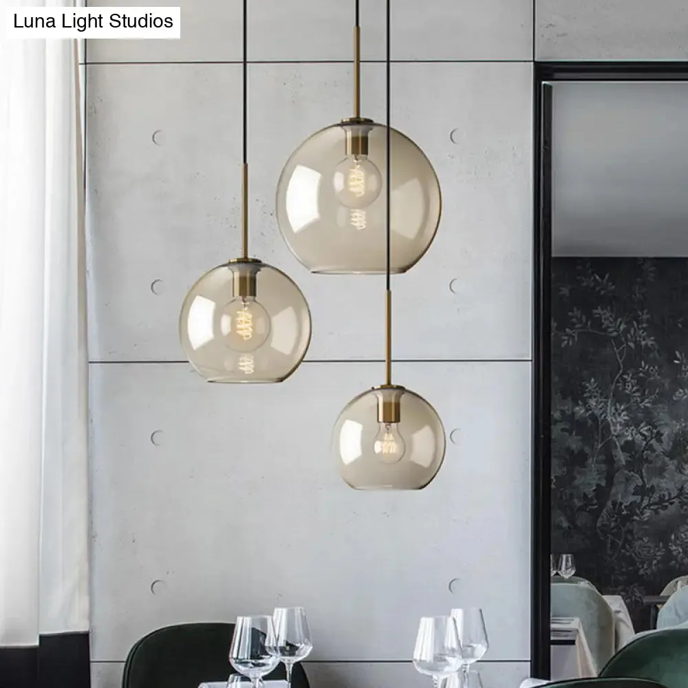 Minimalist 3-Light Pendant with Amber Glass Shade and Black Finish